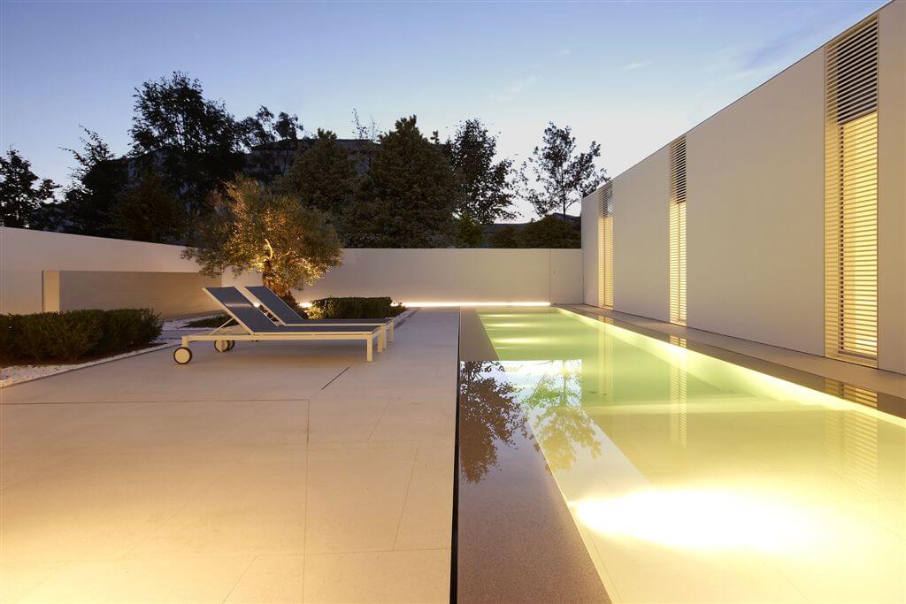 Here's the opposite view of the pool area, with floor to ceiling windows extending the length of the home. Here's the opposite view of the pool area, with floor to ceiling windows extending the length of the home.