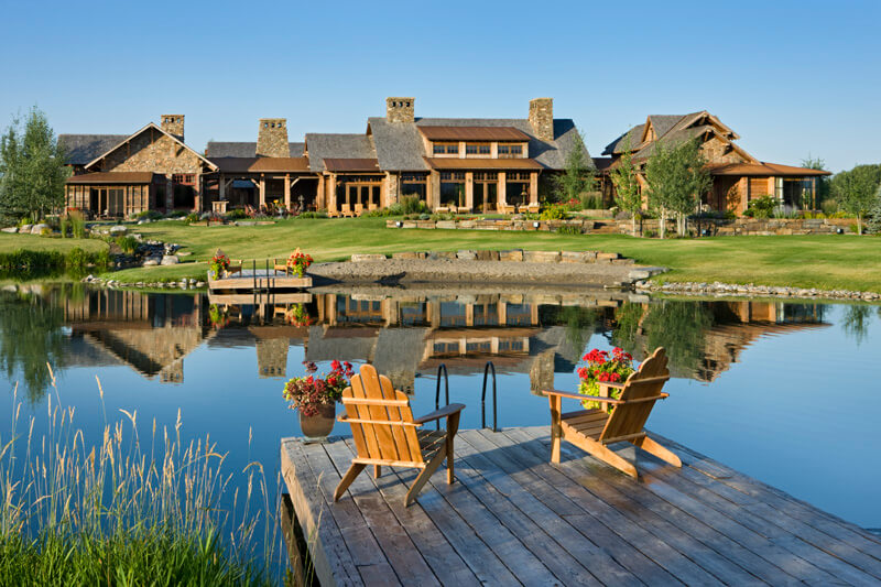 View of the home from across swimming pond. Builder: Schlauch Bottcher Construction Interior Design: <a href=“http://www.locatiarchitects.com/“>Locati Interiors</a> Photography: <a href=“http://www.rogerwadestudio.com/“>© Roger Wade Studio</a> View of the home from across swimming pond. Builder: Schlauch Bottcher Construction Interior Design: <a href=“http://www.locatiarchitects.com/“>Locati Interiors</a> Photography: <a href=“http://www.rogerwadestudio.com/“>© Roger Wade Studio</a>
