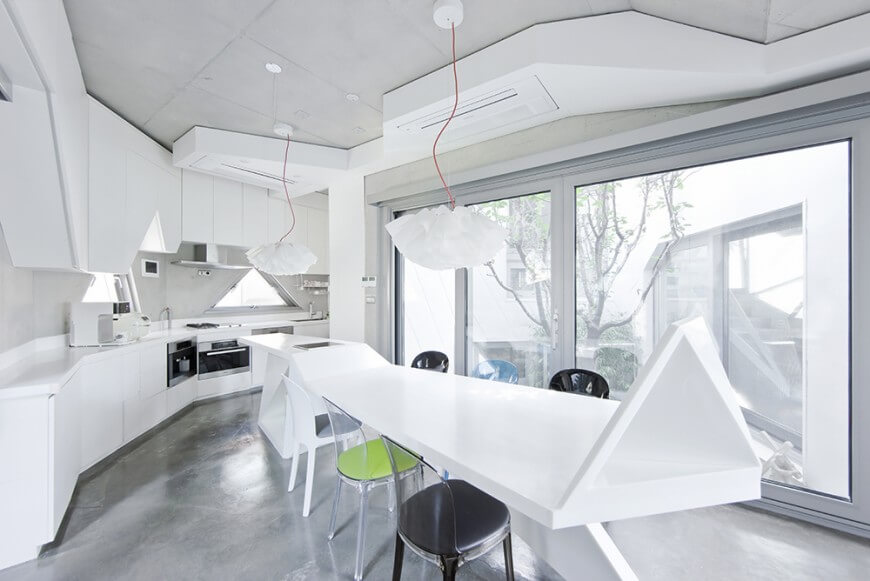 Unique Kitchen with Angles and Stark Pops of Color