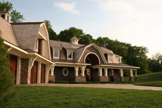 Large home with multiple gambrel sections including running the full length of the home as well as large gambrel shaped dormers. Large home with multiple gambrel sections including running the full length of the home as well as large gambrel shaped dormers.