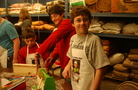 From left, Evan Bracken, 8, Janet Strominger and Chris Colello, 11, of Colonie begin to paint their toolboxes.
