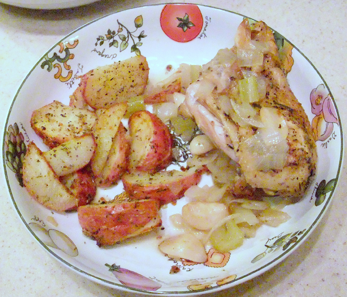 Chicken with 40 cloves of garlic—the garlic is mellow and lends wonderful flavor to the slow cooked chicken!