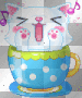 Kitten in cup
