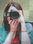 miley with a camera