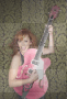 reba with a pink guitar