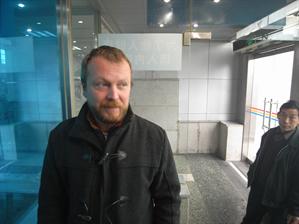 tony in the smoking room at chengdu trainstation