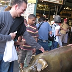 dropped a coin in the pig for a wish