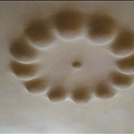 ceiling in the room...either reflects a water drop or breasts, says the audioguide...
