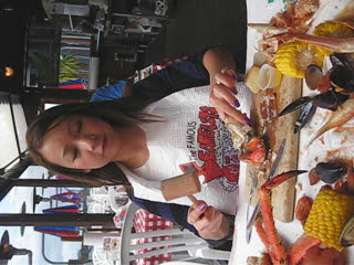 Me beating my crab with a hammer