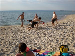 Playing beach aussie football