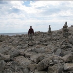 Stone cairns on the sea shore.