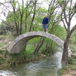 Walks over this Roman bridge ....