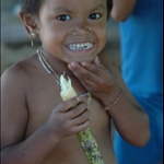 one of the little girls in the Geta village...she is eating sugar cane