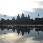 Reflection of the perfectly symmetrical Angkor Wat in the Lotus pond