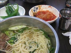 our first korean lunch.  the owner picked it for us...  he brought dwayne the same thing but without the beef.