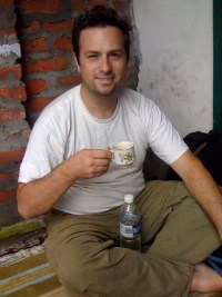 Josh with chai in India