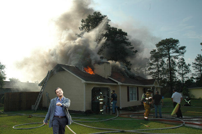 http://s3.amazonaws.com/kym-assets/photos/images/newsfeed/000/070/585/house_fire.jpg?1318992465