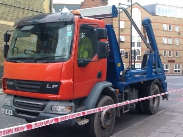Skip lorry at the scene where a cyclist died. Credit: Charlie Lloyd