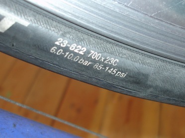 Your tyre wall should say what pressure you should pump your tyres to