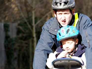 Dropping a child off to school before going to work Credit: Stuart Coles