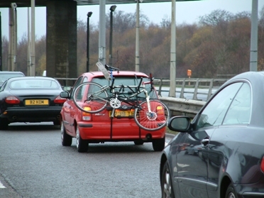 Be careful that your bike does not obscure your lights or number plate