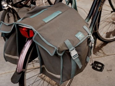 Panniers mean your bike carries the load, not you Credit: Rosie Collins