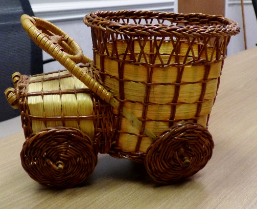 Straw basket shaped like a truck/cart