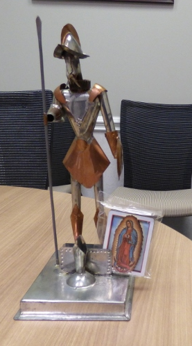 Cervantes sculpture and Virgen de Guadalupe image