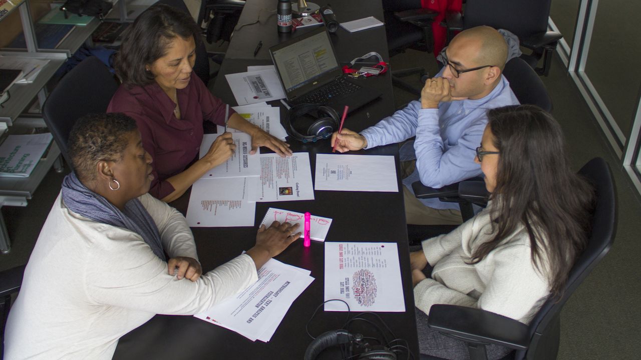 Neely, Kostelecky, McKnight and Dorame review the project.