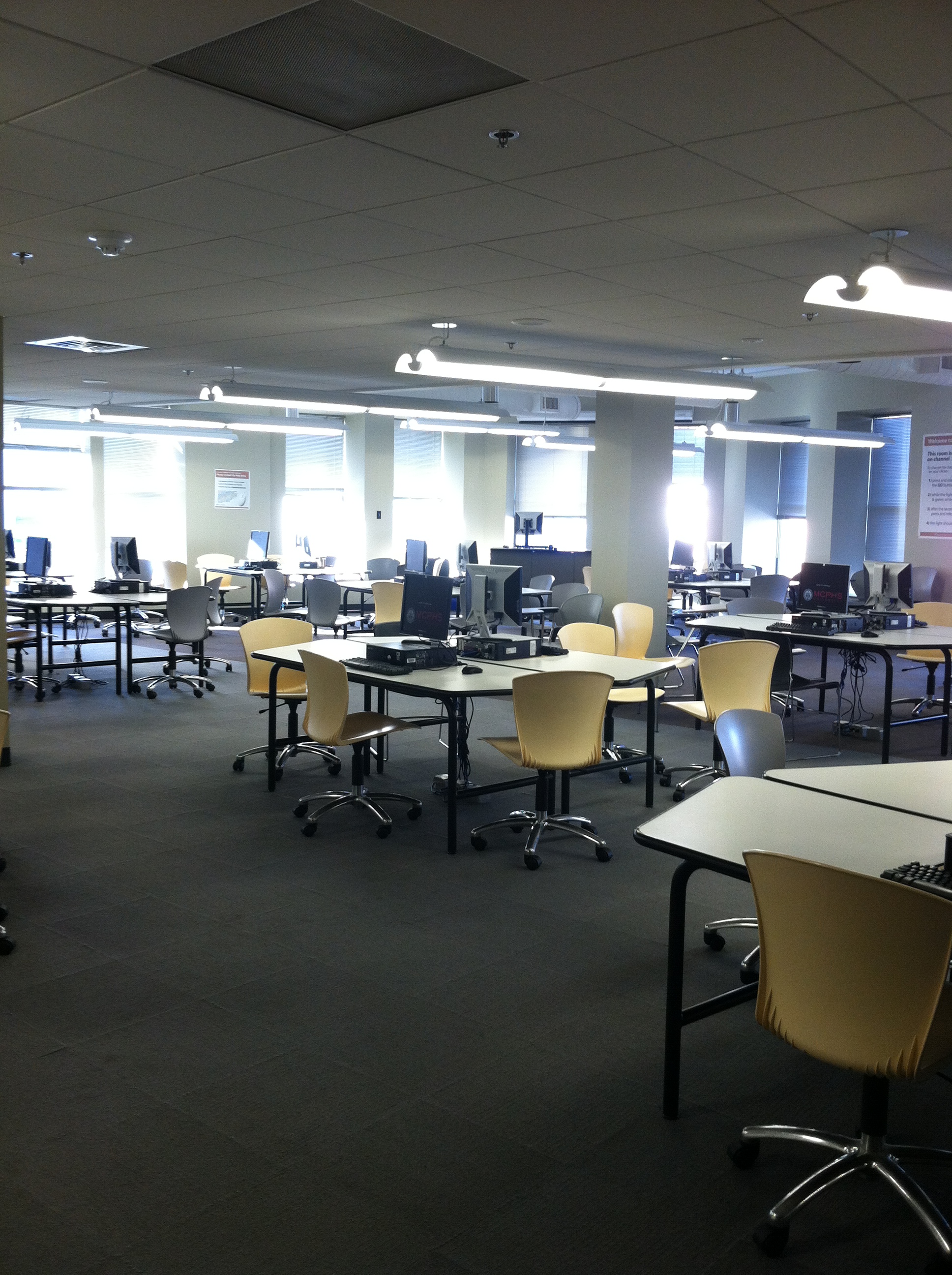 Computer Lab #300 showing groupings of computer workstations with office chairs