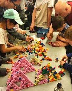 children playing with blocks at the museum of math near Madison Square Park