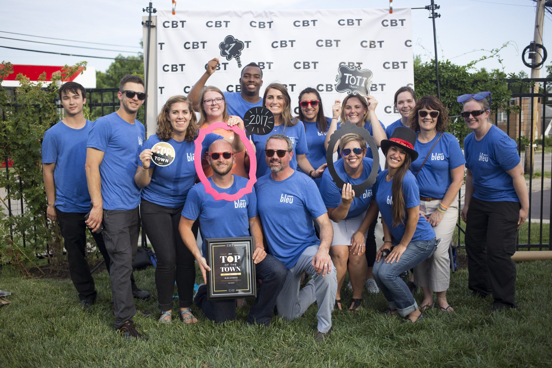 Bleu Events' catering team posing with their Top of the Town Award at event hosted by the Columbia Business Times