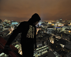 Bradley Garrett, Hanging from a Crane at the New Court building, City of London, 2010. © Bradley Garrett. Showing in BPB12.