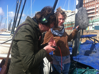 MA students recording sounds on Brighton seafront for artist group Invisible Flock's interactive piece 'Sea of Voices'