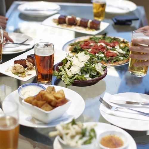 Salad, pizza, beer, chips