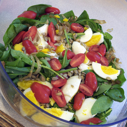 Spinach Salad with Warm Caramelized-Onion Dressing Image