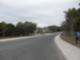 Looking down Alon Loop at the model homes at Woods of Alon