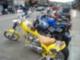 Motorcycles and a chopper on Broadway (Beartooth Rally weekend scheduled in the second half of July of each year)