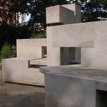 Sculptured stone bench