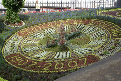 A Floral Clock in Edinburgh, Scotland celebrating a century of Boy Scouts, copyright of rakastajatar on Flickr.