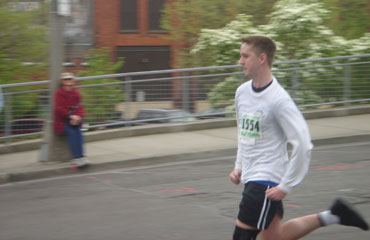 Robert sprints to the end of the Tacoma City Half-Marathon.