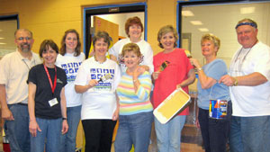 North Springs High School teachers and Harry Norman, Realtors agents team up to give service.
