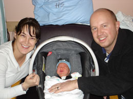 Kristine and John Casey Losh with their new son, John Xavier Losh.