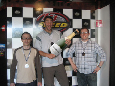 (Left to right) Global Services Membership Manager Jean-Yves Piton places 3rd, Technical Account Manager Joey Pauley places 1st, and Lead Developer Trevor Rowe places second in the Luxury Real Estate go-cart race. Photo copyright of James Hughes.