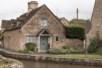 Fine Art Print of UK, House by river by Assaf Frank