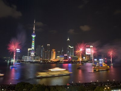 Fine Art Print of China, Shanghai, Fireworks with skyscrapers at night, elevated view by Assaf Frank