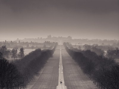 Fine Art Print of England, Berkshire, Aerial view of two people walking on long path with windsor castle in background by Assaf Frank