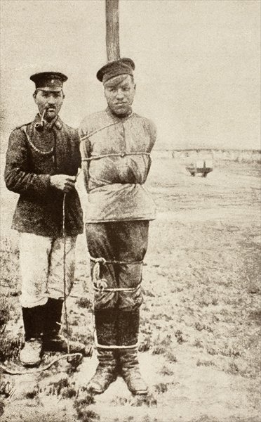 Fine Art Print of A First World War Russian prisoner of war tied to a pole, from 'L'Illustration', published in 1917 by French School