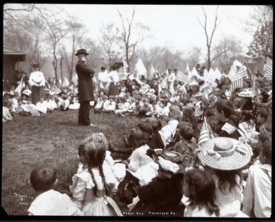 Fine Art Print of Children watching an entertainer on Arbor Day at Tompkins Square Park, New York, 1904 by Byron Company