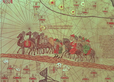 Catalan Atlas, detail showing the family of Marco Polo (1254-1324) travelling by camel caravan, 1375 (vellum) by Spanish School - print